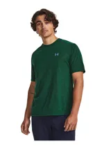 Remera deportiva Under Armour de manga corta, color verde melange, con cuello redondo y el logo de la marca estampado en el pecho.