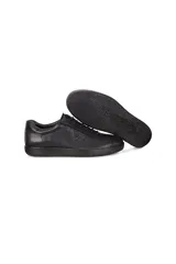 Championes de cuero negro con cordones y suela plana.