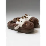Pantuflas de peluche con diseño de vaca, confeccionadas en piel sintética suave. Cuentan con suela de goma antideslizante y diseño abierto en el talón.