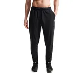Pantalón deportivo Nike Unlimited de color negro, con cintura elástica ajustable mediante cordón, bolsillos laterales y diseño entallado hacia los tobillos.