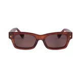 Lentes de sol I-Sea modelo Flynn, con armazón rectangular de acetato en tono marrón traslúcido y micas oscuras.
