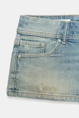 Shorts mini de denim TRF de tiro bajo, con cinco bolsillos, trabillas y cierre frontal con cremallera y botones metálicos.