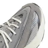 Championes Adidas Lightblaze color gris con detalles en blanco. Zapatillas urbanas con tecnología Lightstrike para mayor amortiguación y confort.