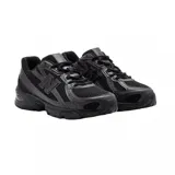 Championes New Balance modelo 740, color negro, con diseño técnico y deportivo de malla y refuerzos sintéticos, con la distintiva "N" en los laterales y tecnología ABZORB en la suela.