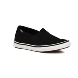 Zapatillas slip-on negras de lona con elástico en los laterales, suela blanca con línea negra y talón reforzado.