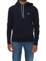 Canguro azul marino de algodón con capucha, cordones blancos y logo de zorro bordado en el pecho.