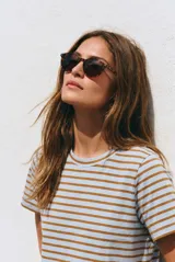 Lentes de sol polarizados con armazón carey de diseño redondo y lentes marrones.