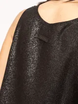 Musculosa blanca de lino con escote redondo y corte a la cadera.