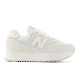 Championes New Balance 574 de dama color blanco hueso, con capellada de gamuza y mesh, entresuela con tecnología ENCAP y suela de goma.