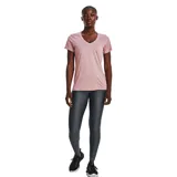 Remera Under Armour Tech para mujer, color coral con textura jaspeada y logo en el pecho.