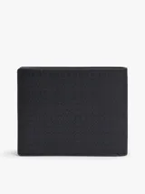 Billetera mini Tommy Hilfiger de cuero azul marino con acabado emboss de monograma TH, diseño compacto con ranuras para tarjetas y placa metálica con el logo de la marca.