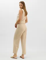 Pantalón tejido de corte recto y diseño fluido, color amarillo, con cintura ancha elastizada.