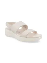 Sandalias Hush Puppies modelo Breathe Slingback, color blanco off-white, con doble tira ancha en el empeine y tira ajustable en el talón. Cuenta con suela de plataforma corrida.