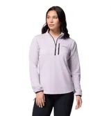 Buzo tipo polar de mujer con cierre de media cremallera, cuello alto y bolsillo frontal con cierre en el pecho. Presenta tecnología de absorción de humedad y ribetes en puños y cuello.