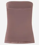 Blusa blanca sin breteles, confeccionada en microfibra, con detalle de encaje en el lateral y corte ajustado.