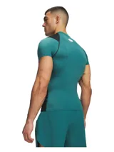 Remera térmica deportiva Under Armour HeatGear Elite de manga corta, con diseño ajustado de compresión en color verde azulado y paneles negros en los hombros y laterales. Cuenta con cuello redondo y el logo de la marca en el pecho.