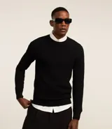 Suéter masculino de cuello redondo y manga larga, confeccionado en tejido de malla con textura de cuadros grid. Presenta un diseño minimalista y versátil, ideal para diversas ocasiones.