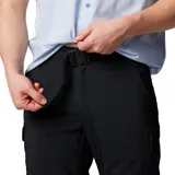 Pantalón convertible de senderismo color negro, con diseño funcional que permite desmontar las perneras mediante cremalleras para convertirlo en short. Cuenta con bolsillos cargo laterales, bolsillos de seguridad con cierre, cintura parcialmente elástica con cinturón integrado y tecnología de secado rápido y protección solar.