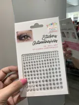 Set de stickers autoadhesivos con forma de brillantes plateados, ideales para decorar uñas, rostro y cuerpo.