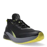 Championes deportivos Topper modelo Squat II, color negro con detalles en gris y amarillo neón. Presentan una capellada de malla transpirable con refuerzos sintéticos, cierre por cordones y suela con tecnología T-Cushion para mayor amortiguación.