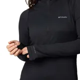 Remera de manga larga Columbia con media cremallera, confeccionada en tejido técnico negro con tecnología Omni-WICK para control de humedad y olores, y protección solar Omni-Shade UPF 50. Presenta cuello alto, ajuste entallado y aberturas para pulgares en los puños.