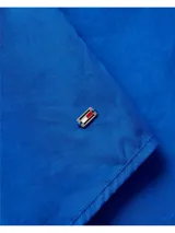 Camisa azul de algodón orgánico, corte amplio y mangas raglán.