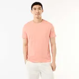 Camiseta recta de punto lisa color naranja salmón, de manga corta y cuello redondo.