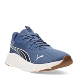 Championes Puma Flexfocus Lite Modern, color azul con entresuela blanca y suela de goma color caramelo. Presentan un diseño deportivo con malla transpirable, cierre de cordones y logo de la marca en el lateral y la puntera.