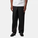 Pantalón de jean negro de corte recto y relajado, inspirado en la ropa de trabajo, con costuras en contraste y bragueta con cremallera.