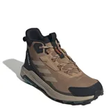 Championes de trekking Adidas Terrex Anylander Mid, de caña media, color marrón con detalles en negro. Presentan diseño robusto con refuerzos en la puntera y talón, cordones ajustables y suela con relieve para mayor tracción.