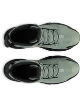 Bota táctica Under Armour modelo Charged Valsetz Mid, color verde oliva con suela negra. Presenta una parte superior sintética transpirable con refuerzos de PU, entresuela Charged Cushioning para amortiguación y suela exterior Vibram XS Trek para mayor tracción y durabilidad.