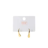 Caravanas doradas con forma de gota, de la marca Miss Carol.