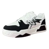 Championes urbanos de diseño chunky, combinando paneles en color blanco y negro con detalles de estampado tipo salpicadura. Presentan suela de plataforma con relieve y cordones al tono.