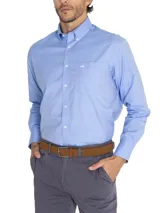 Camisa de manga larga de la marca Rockford, modelo Wor Travel, en color azul. Presenta cuello italiano abotonado, cierre frontal de botones, bolsillo en el pecho con el logo bordado y puños con doble botón.
