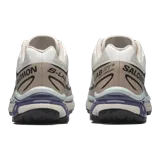 Championes Salomon modelo XT-6 de color negro, diseñados para trail running y uso urbano, con sistema de ajuste rápido Quicklace y suela con gran tracción.