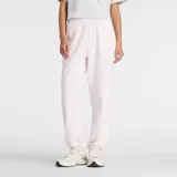 Pantalon de jogging New Balance, color rosa claro, con cintura elástica, bolsillos laterales y logo bordado pequeño en la pierna. Diseño de corte holgado.