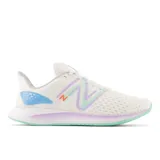 Championes New Balance WLWKRNM1 para dama, color blanco con detalles en lila, celeste y verde agua.