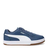 Championes urbanos Puma modelo Caven 2.0 para hombre, color blanco. Presentan un diseño de inspiración basquetbolística de los años 80, con capellada de cuero sintético, perforaciones en la puntera y suela de goma.