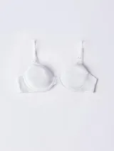 Brasier escotado tipo demi de la línea Minimalist de Calvin Klein, confeccionado en microfibra suave. Cuenta con copas sin relleno, aros para mayor sujeción, tirantes ajustables convertibles para espalda cruzada y cierre de gancho en la parte trasera.