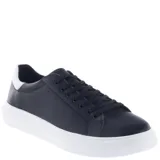 Zapatos urbanos de hombre con diseño minimalista, confeccionados en cuero sintético negro con suela de goma blanca y detalle en el talón.