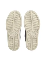 Zapatillas de tenis Tommy Jeans de corte bajo, confeccionadas en piel napa negra. Presentan cordones al tono, suela de goma color crema, panel a contraste en el talón y parche distintivo de la marca en el lateral.