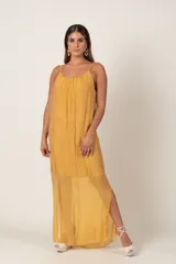 Vestido largo azul marino de seda italiana, con breteles finos ajustables, tajos laterales y forro corto.