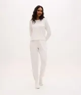 Pantalón de pijama tipo jogger para mujer, confeccionado en poliéster con elastano, con estampado de cuadros y cintura elástica con lazo.