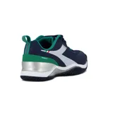 Championes de tenis Diadora modelo Blushield Torneo 2 AG, color azul marino con detalles en verde, blanco y gris. Presentan el logo de la marca en los laterales y tecnología Blushield para mayor amortiguación y estabilidad.