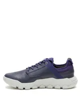 Championes Caterpillar modelo Hex Lite Leather, color azul con suela chunky blanca y detalles en negro. Confeccionados en cuero y material textil, con cordones y la marca grabada en el lateral.