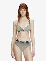 Soutien de copa suave Diesel confeccionado en tejido de punto elástico con efecto desteñido tipo denim. Presenta banda inferior elástica con logo de la marca.