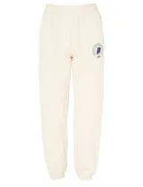 Pantalón deportivo de algodón color crema con logo estampado en azul marino.