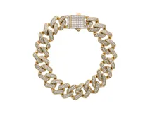 Pulsera dorada de eslabones gruesos con incrustaciones de circonitas. Cierre con broche cuadrado con circonitas.