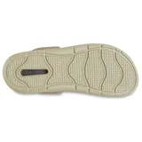 Zuecos Crocs modelo InMotion LiteRide Clog, de color gris en la parte superior perforada con tira trasera pivotante y suela gruesa de plataforma en color blanco con detalles negros.