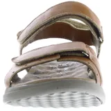Sandalias de cuero color marrón con ajuste de velcro en el empeine y el talón. Presentan una suela de goma ergonómica en tono gris y logo de la marca grabado en la tira superior.